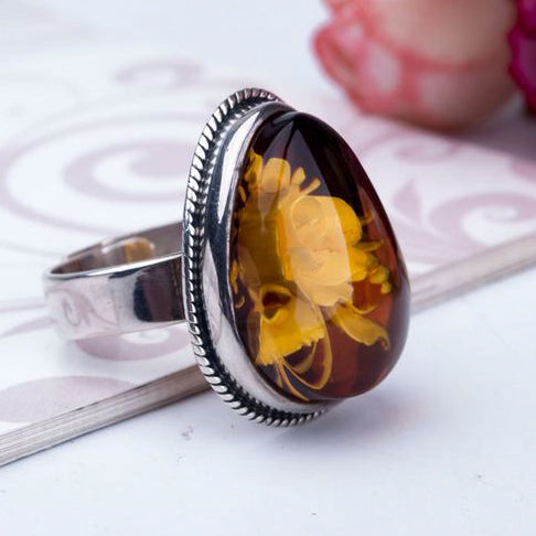 Baltic Amber & Silver Ring with Flower Carved