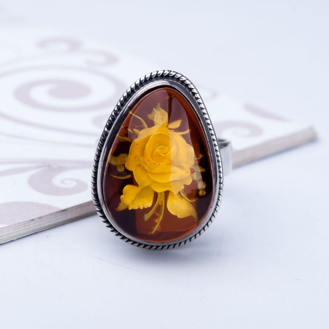 Baltic Amber & Silver Ring with Flower Carved
