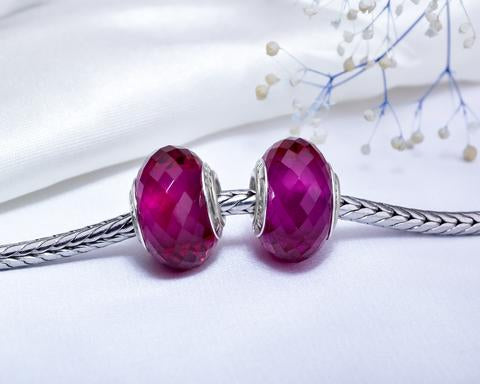 Faceted Red Corundum Bead AMPEARL logo 3