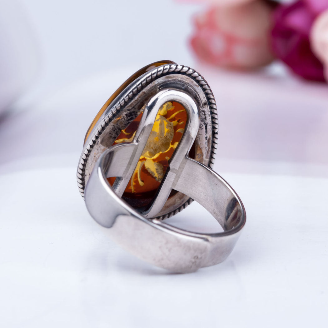 Baltic Amber & Silver Ring with Flower Carved