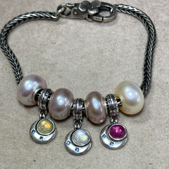 Multi-Dangle Beaded Charm Bracelet. Stunning Glass Beads Handwired with Delicate Silver Spacers Onto A Nickle-Free Silver Plated Chain.